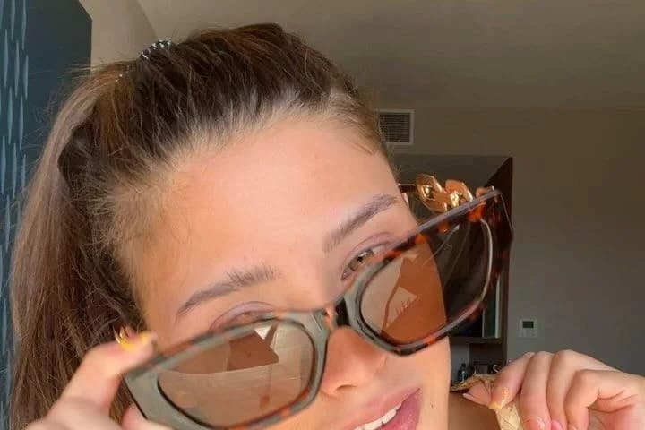 April smiling in sunglasses